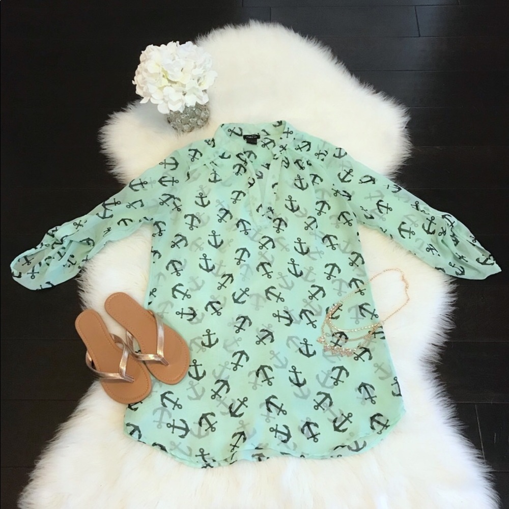 Rue 21 long/quarter length sleeve sheer top.